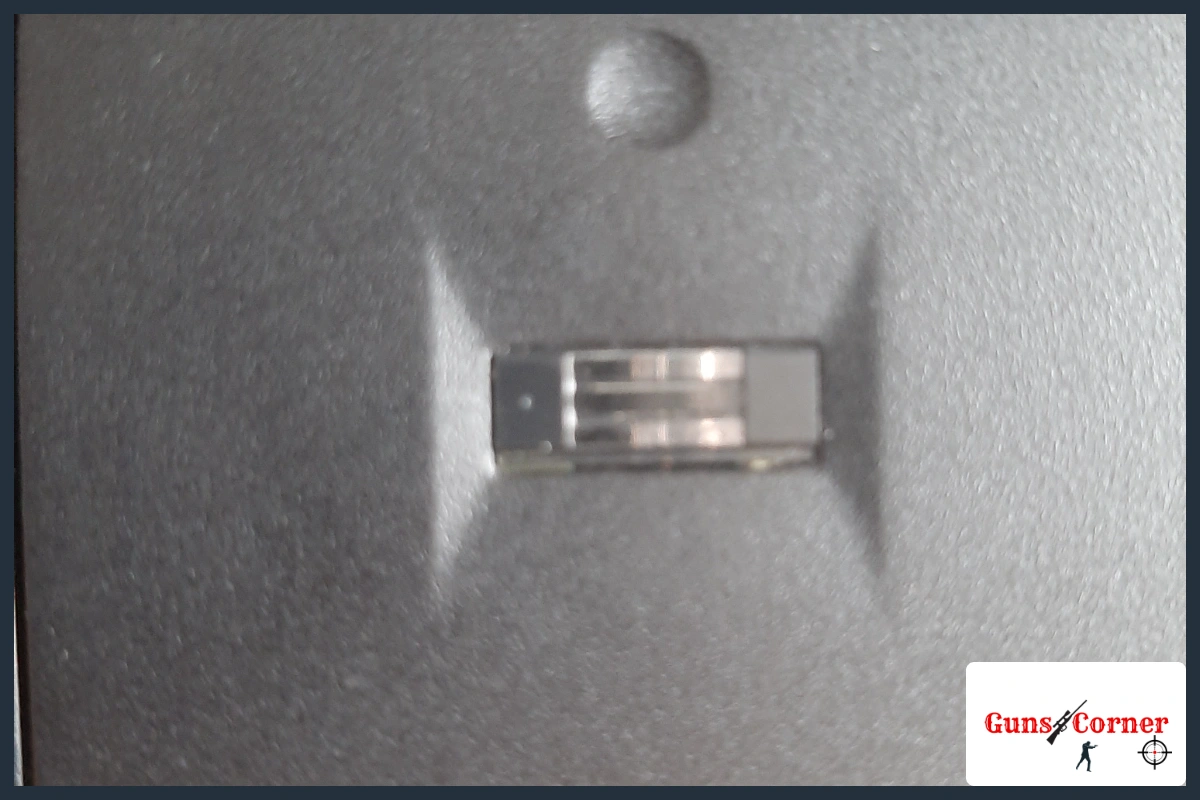 Are biometric gun safes reliable: close-up of a fingerprint scanner sensor pad