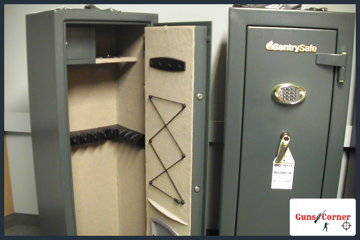 Two gun safes side by side, one open showing rifle racks and one closed with an electronic keypad lock